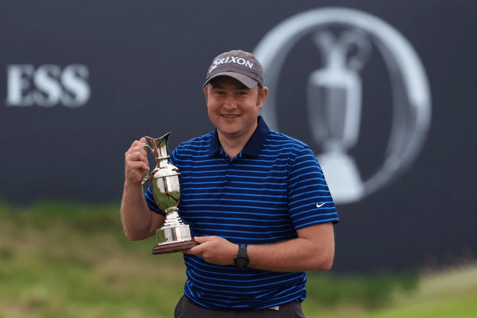Clee Hold The Famous Claret Jug